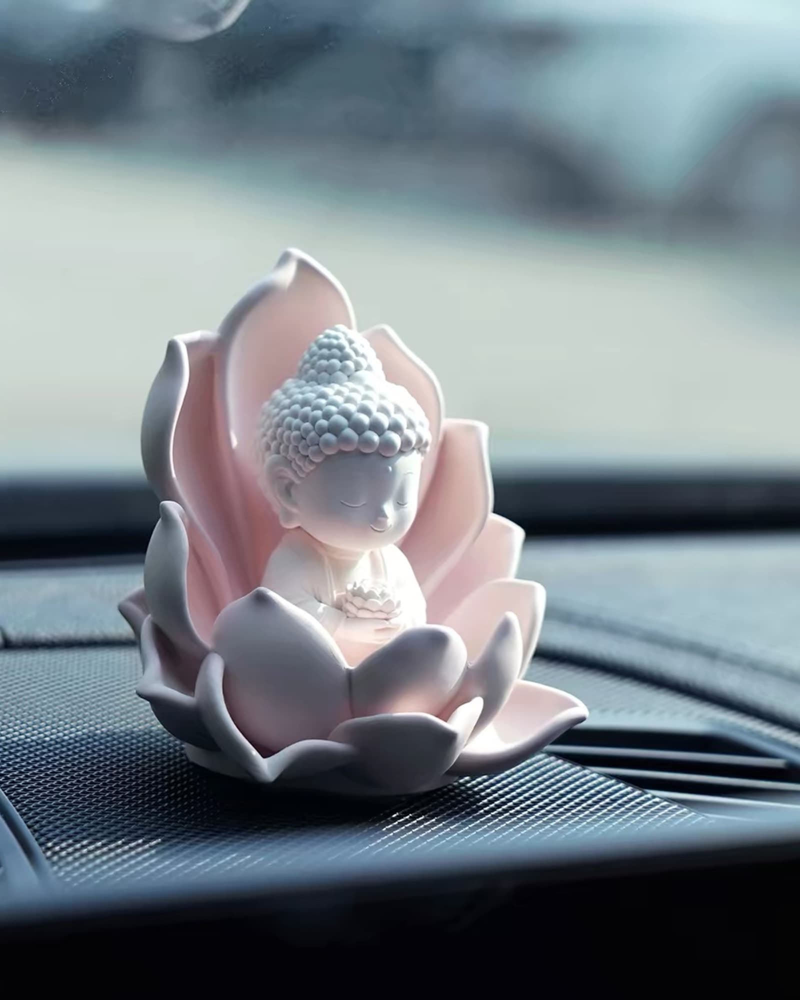 Little Buddha (小佛) — A small seated Buddha in white porcelain, a quiet presence for the table.