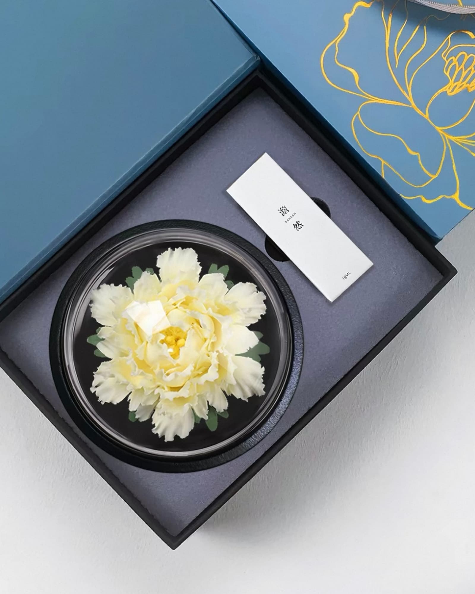 Peony (牡丹) — The king of flowers, hand-pinched in white porcelain — a Luoyang peony that doubles as an aroma diffuser.